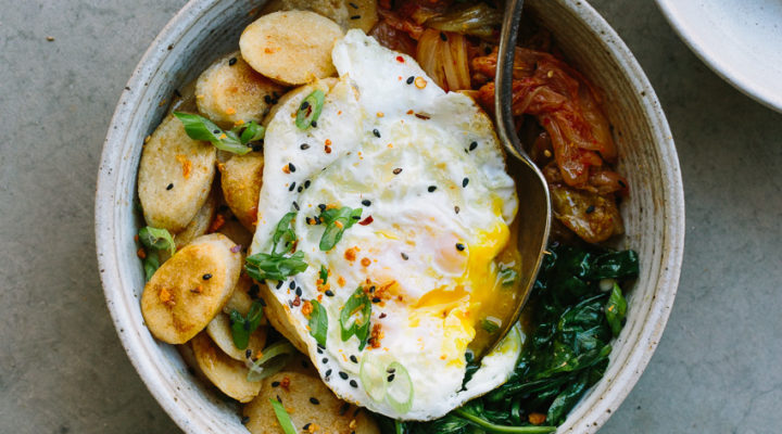 Korean Crispy Brown Rice Cakes with Kimchi, Spinach, and Fried Egg